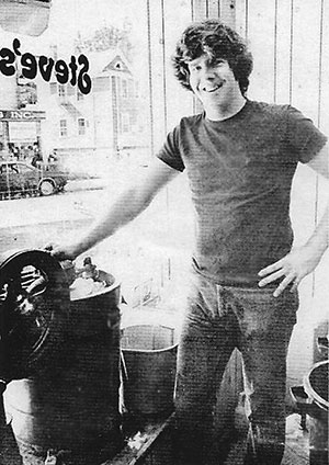 Steve Herrell posing with one of his custom ice cream machines inside Steve’s Ice Cream in 1973.